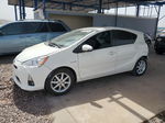 2013 Toyota Prius C  White vin: JTDKDTB30D1042576