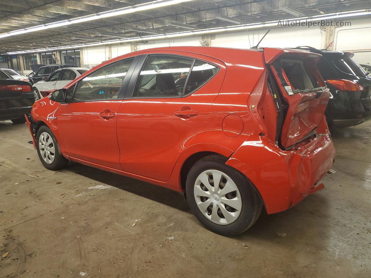 2013 Toyota Prius C  Red vin: JTDKDTB30D1057630