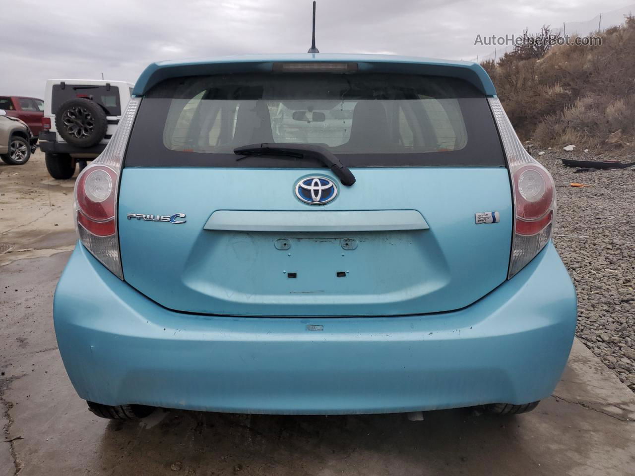 2014 Toyota Prius C  Turquoise vin: JTDKDTB30E1077457