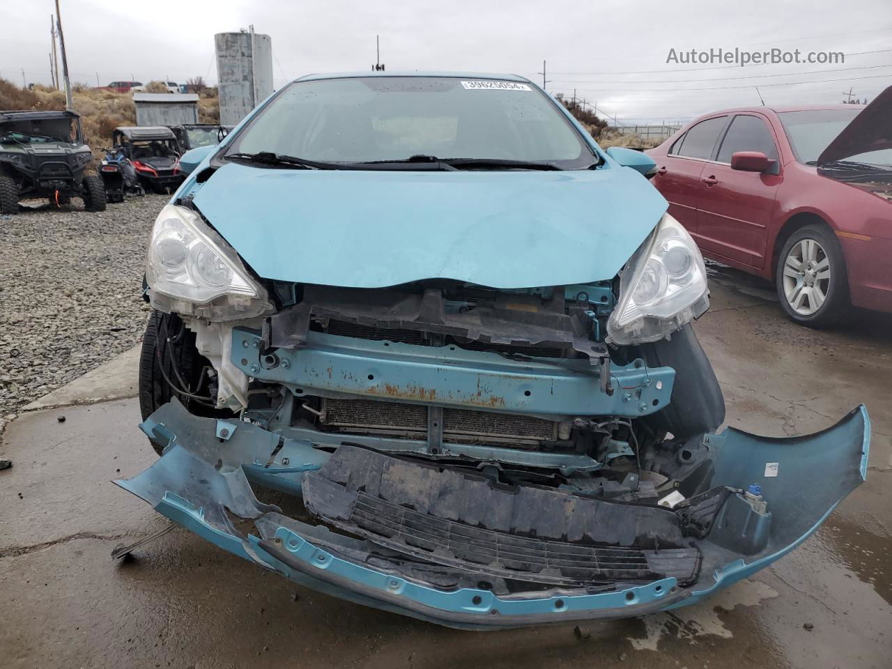 2014 Toyota Prius C  Бирюзовый vin: JTDKDTB30E1077457