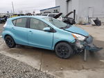 2014 Toyota Prius C  Turquoise vin: JTDKDTB30E1077457