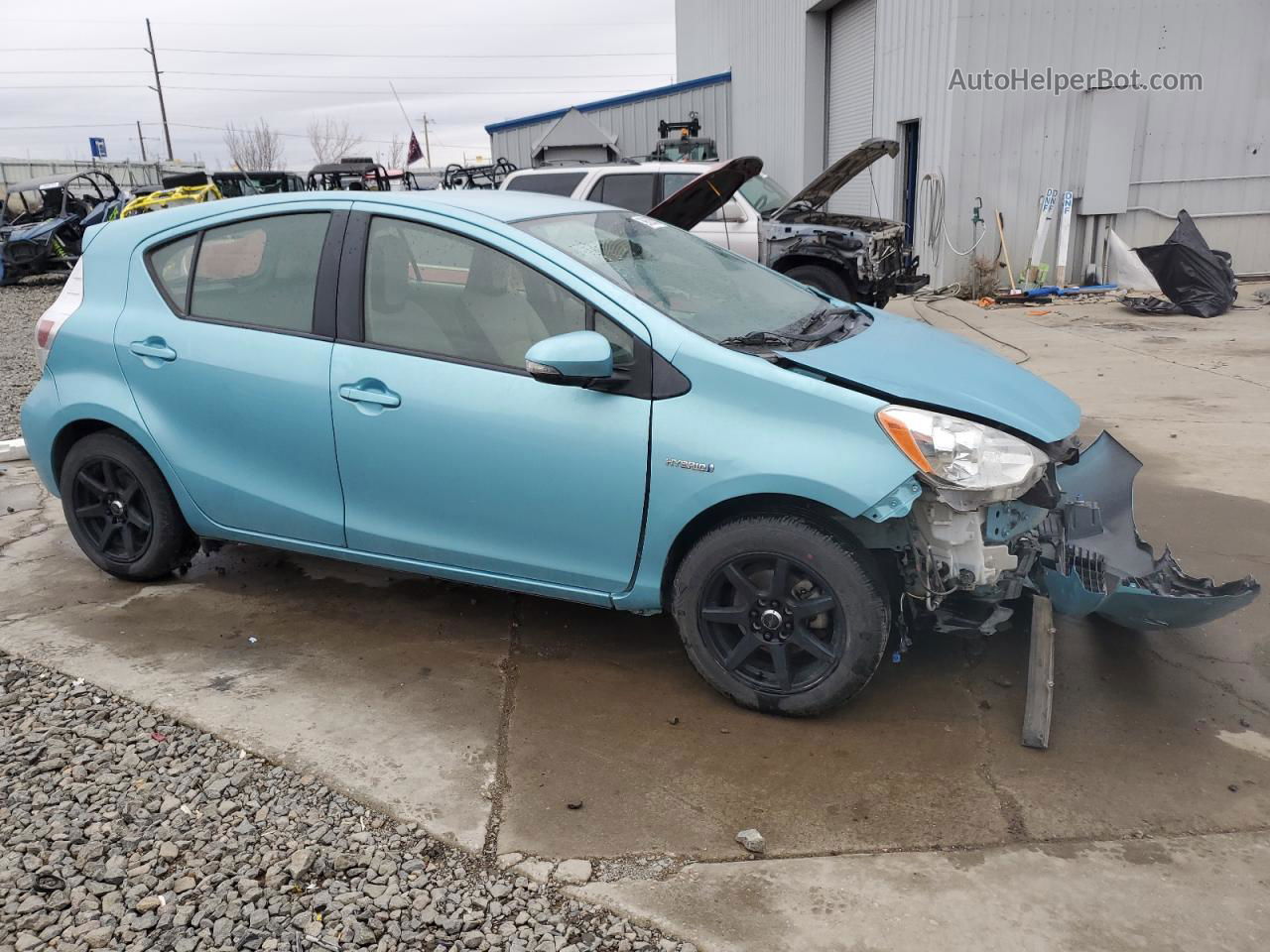 2014 Toyota Prius C  Бирюзовый vin: JTDKDTB30E1077457