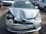 2014 Toyota Prius C One/three/two/four Серебряный vin: JTDKDTB30E1085655