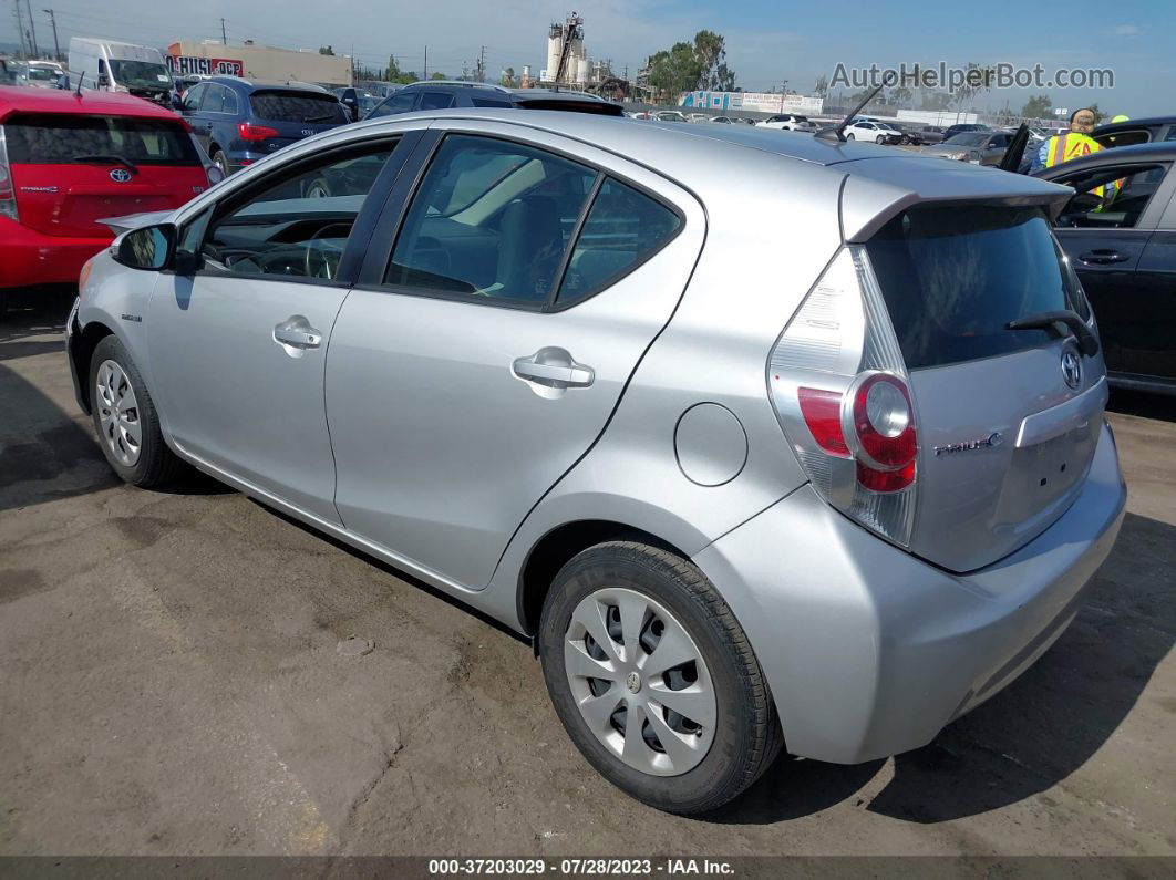 2014 Toyota Prius C One/three/two/four Серебряный vin: JTDKDTB30E1085655