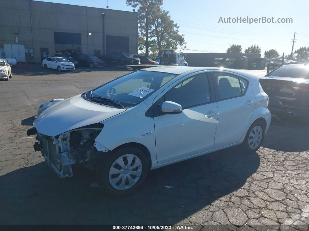 2014 Toyota Prius C One/three/two/four White vin: JTDKDTB30E1561189