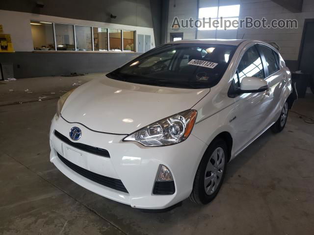 2012 Toyota Prius C  White vin: JTDKDTB31C1500320