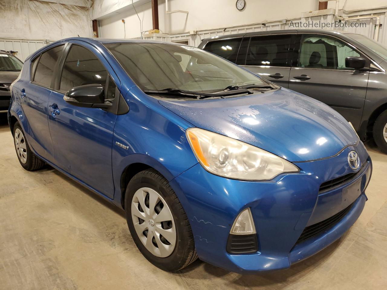 2012 Toyota Prius C  Blue vin: JTDKDTB31C1520910