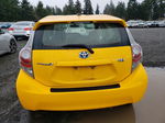 2014 Toyota Prius C  Yellow vin: JTDKDTB31E1061459