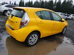 2014 Toyota Prius C  Yellow vin: JTDKDTB31E1061459