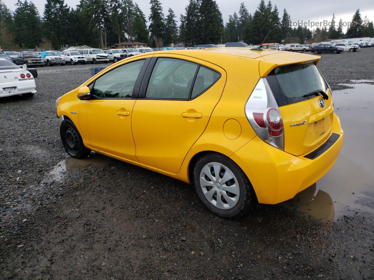 2014 Toyota Prius C  Yellow vin: JTDKDTB31E1061459