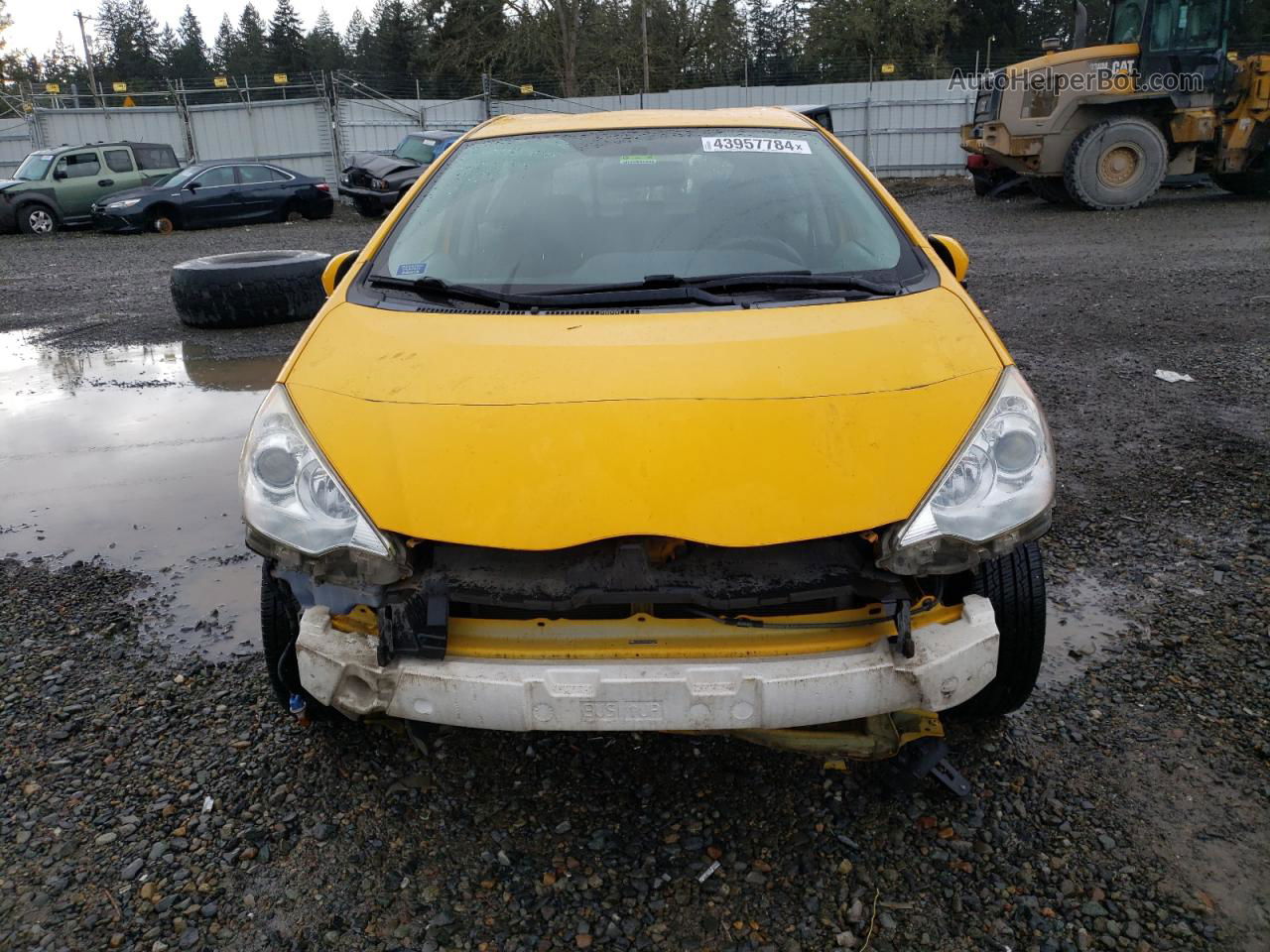 2014 Toyota Prius C  Yellow vin: JTDKDTB31E1061459