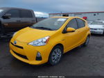 2014 Toyota Prius C Two Желтый vin: JTDKDTB31E1086040