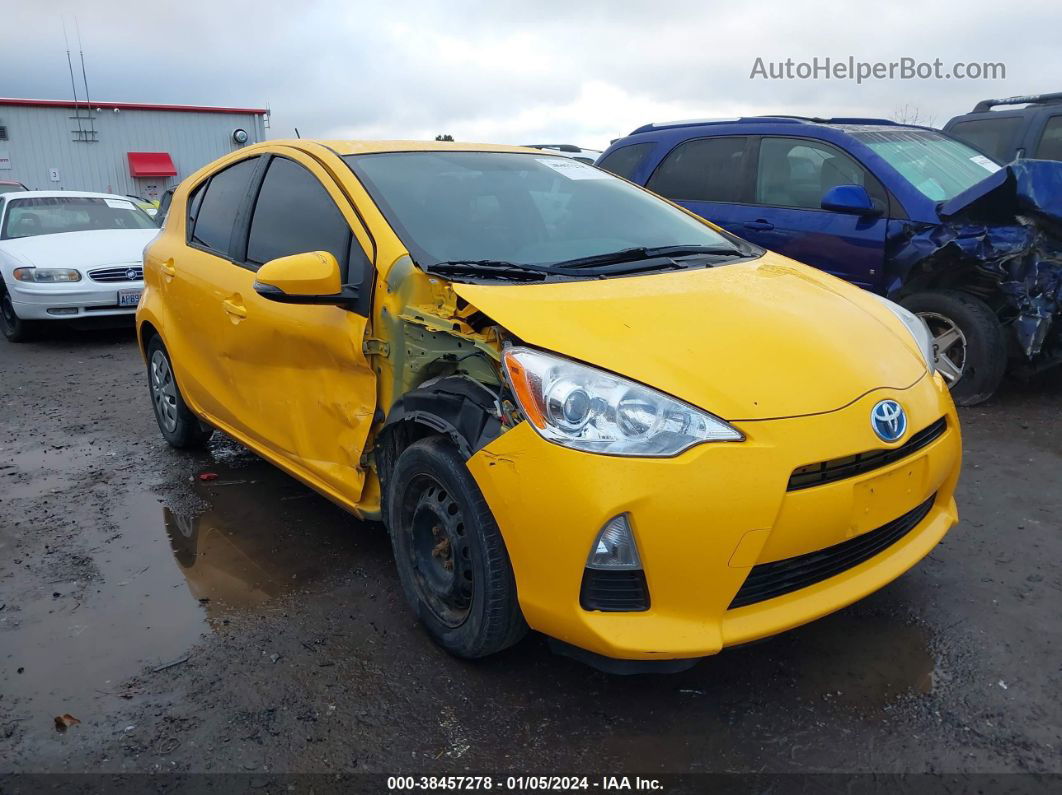 2014 Toyota Prius C Two Yellow vin: JTDKDTB31E1086040