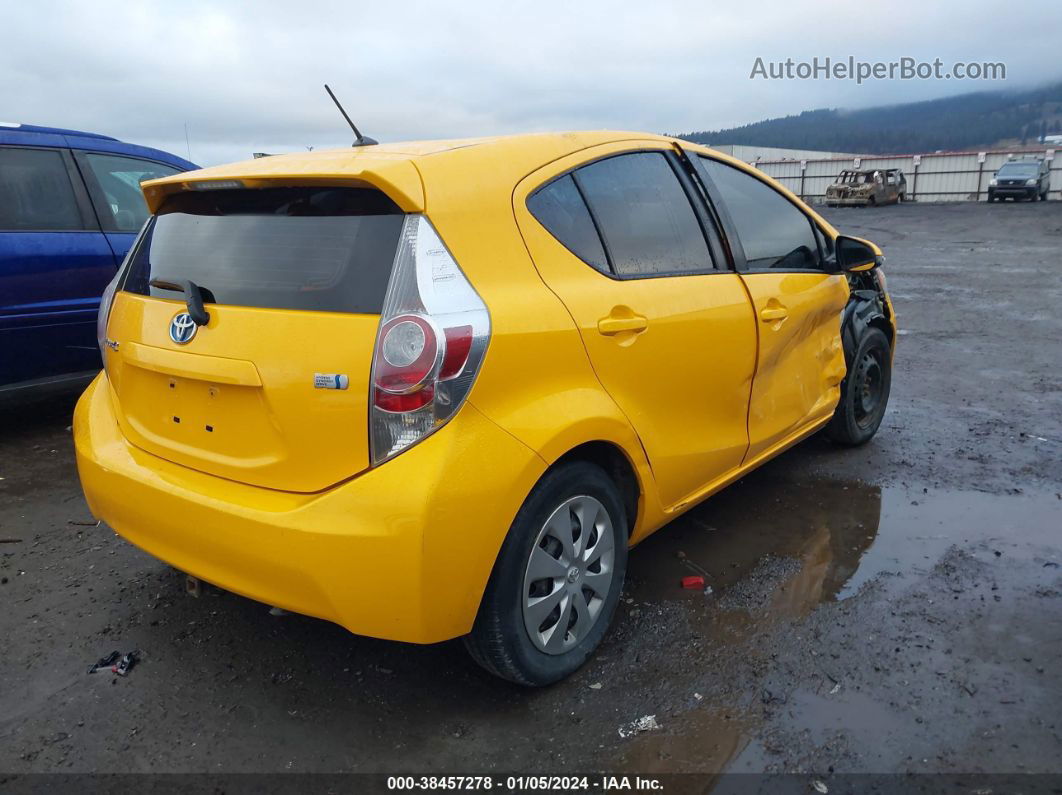 2014 Toyota Prius C Two Yellow vin: JTDKDTB31E1086040