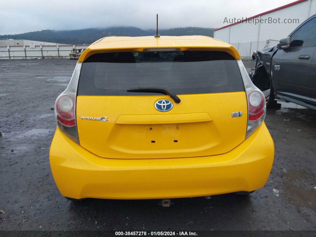 2014 Toyota Prius C Two Yellow vin: JTDKDTB31E1086040