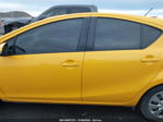 2014 Toyota Prius C Two Yellow vin: JTDKDTB31E1086040