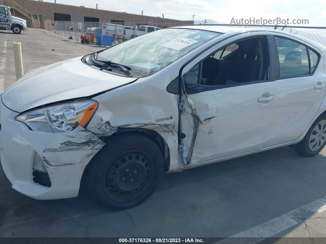 2014 Toyota Prius C One/three/two/four White vin: JTDKDTB31E1569401