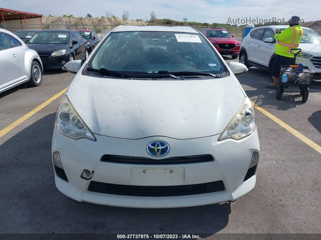 2014 Toyota Prius C Three Белый vin: JTDKDTB31E1571505