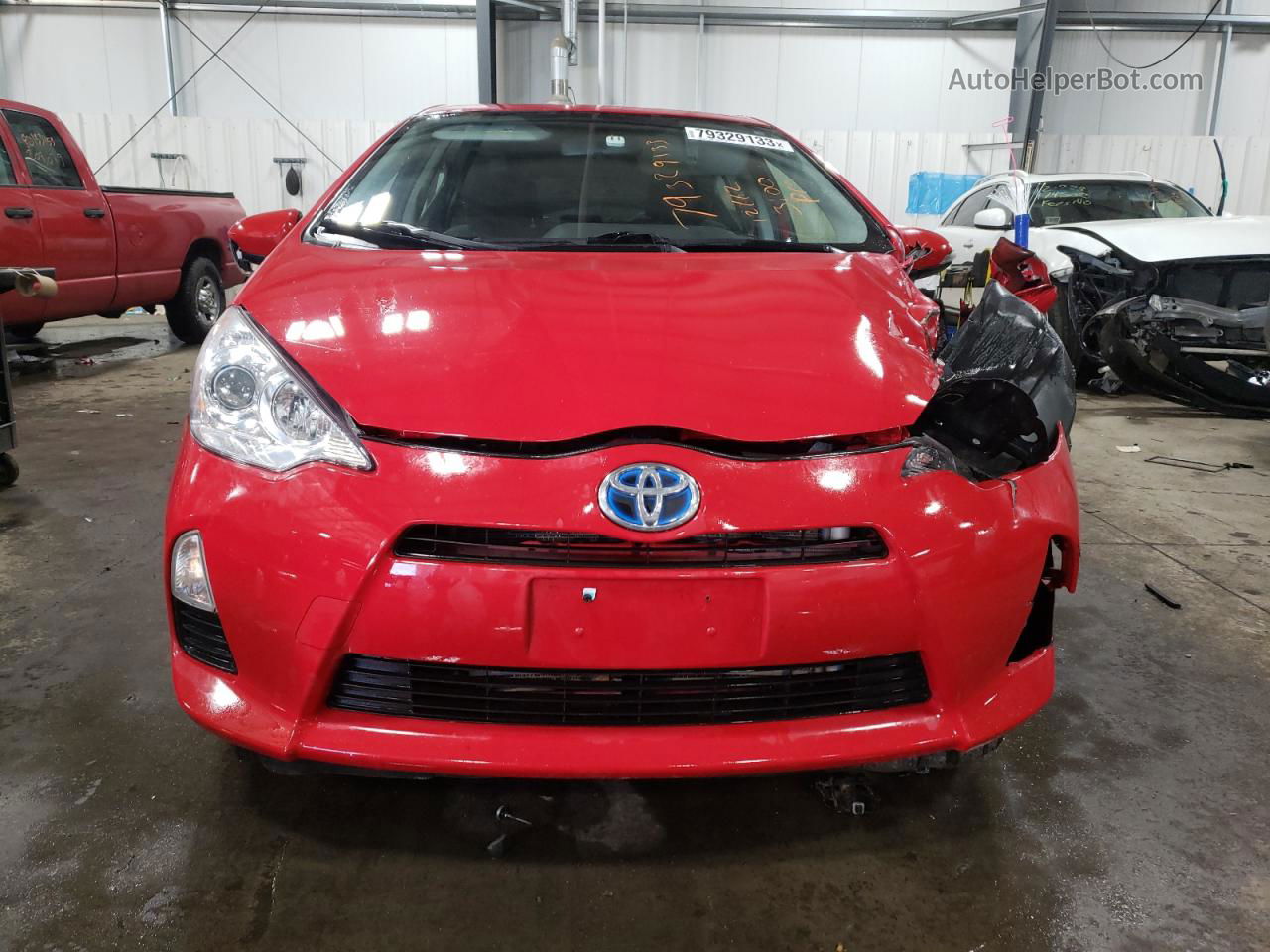 2012 Toyota Prius C  Red vin: JTDKDTB32C1508930