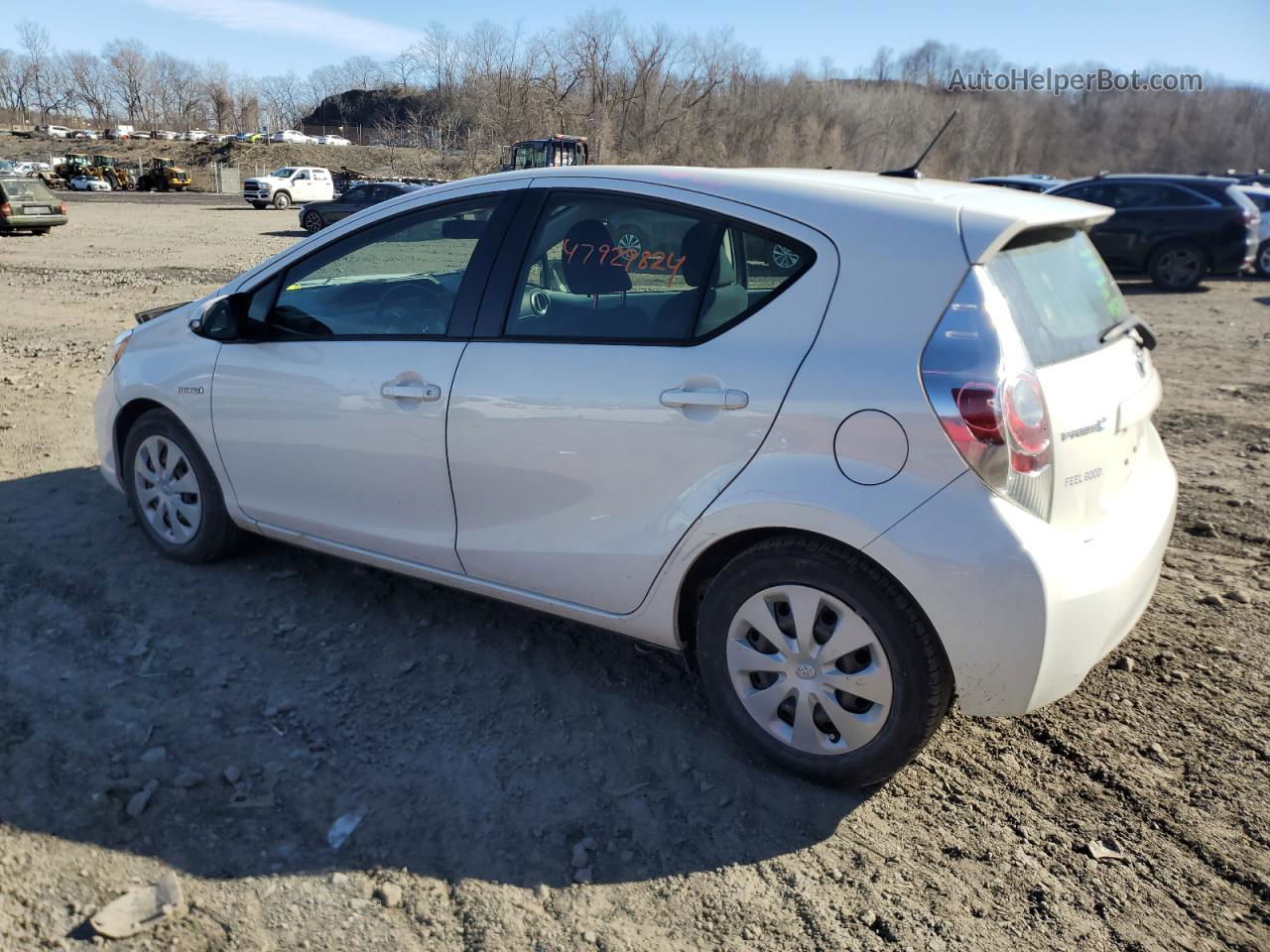 2013 Toyota Prius C  White vin: JTDKDTB32D1046659