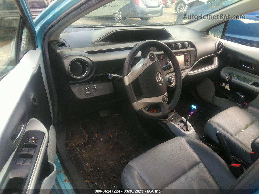 2014 Toyota Prius C One/three/two/four Бирюзовый vin: JTDKDTB32E1066573