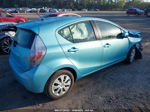 2014 Toyota Prius C One/three/two/four Teal vin: JTDKDTB32E1067058