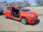 2014 Toyota Prius C Three Оранжевый vin: JTDKDTB32E1077573