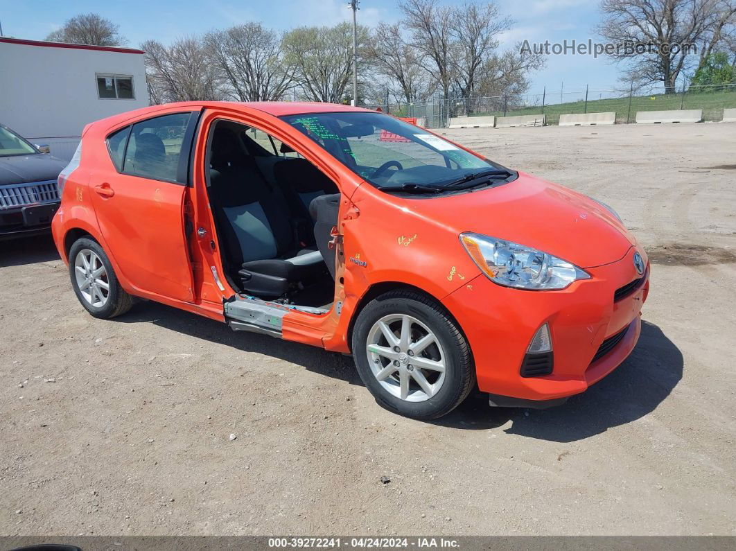 2014 Toyota Prius C Three Orange vin: JTDKDTB32E1077573