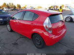 2014 Toyota Prius C One Red vin: JTDKDTB32E1083356