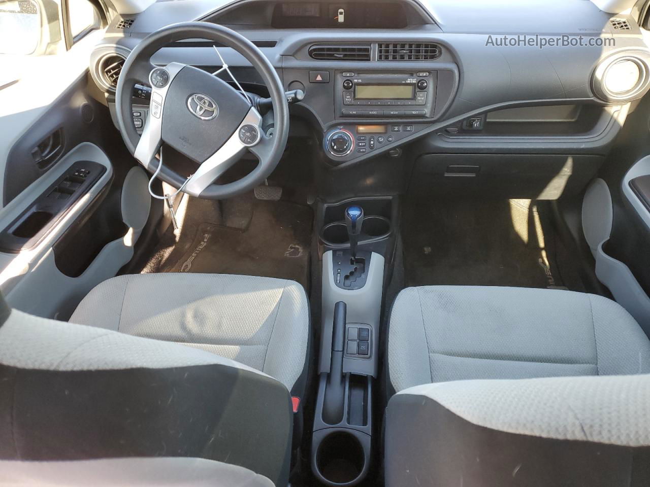 2012 Toyota Prius C  Серебряный vin: JTDKDTB33C1003852