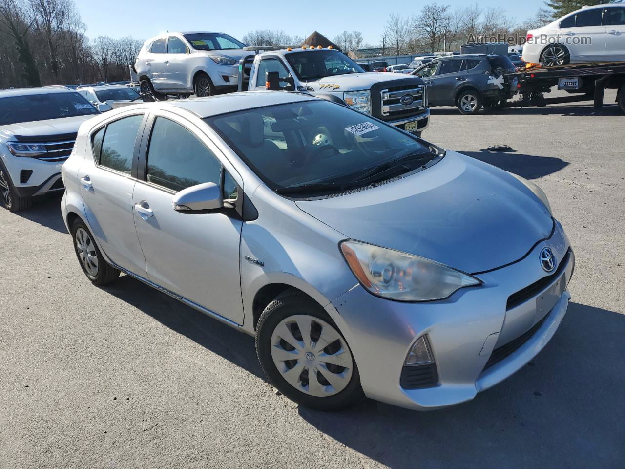 2012 Toyota Prius C  Серебряный vin: JTDKDTB33C1003852