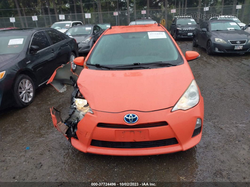 2014 Toyota Prius C One/three/two/four Orange vin: JTDKDTB33E1060300