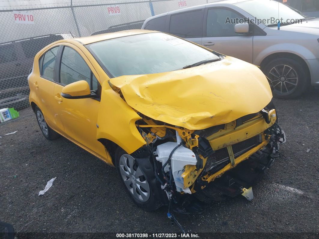 2014 Toyota Prius C One Yellow vin: JTDKDTB33E1064959