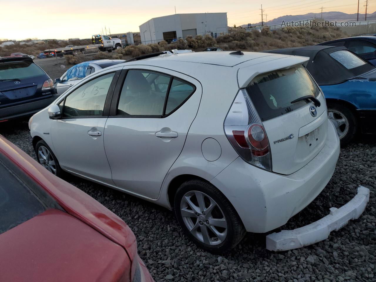 2014 Toyota Prius C  White vin: JTDKDTB33E1070289