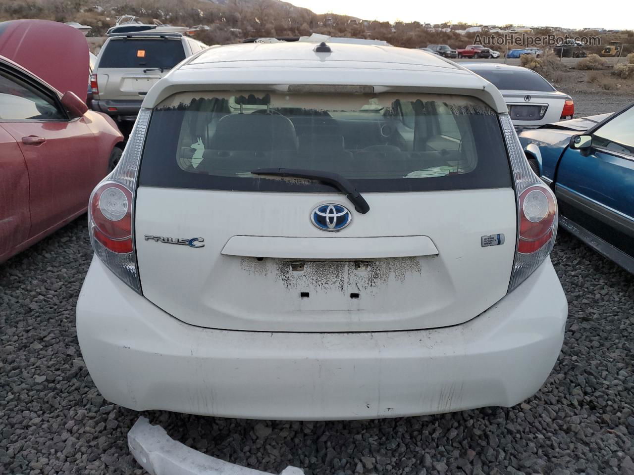 2014 Toyota Prius C  White vin: JTDKDTB33E1070289