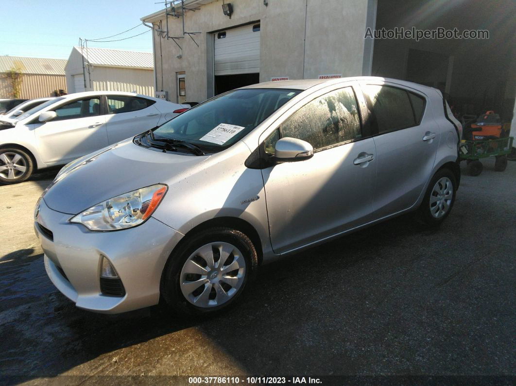 2014 Toyota Prius C One/three/two/four Silver vin: JTDKDTB33E1071040