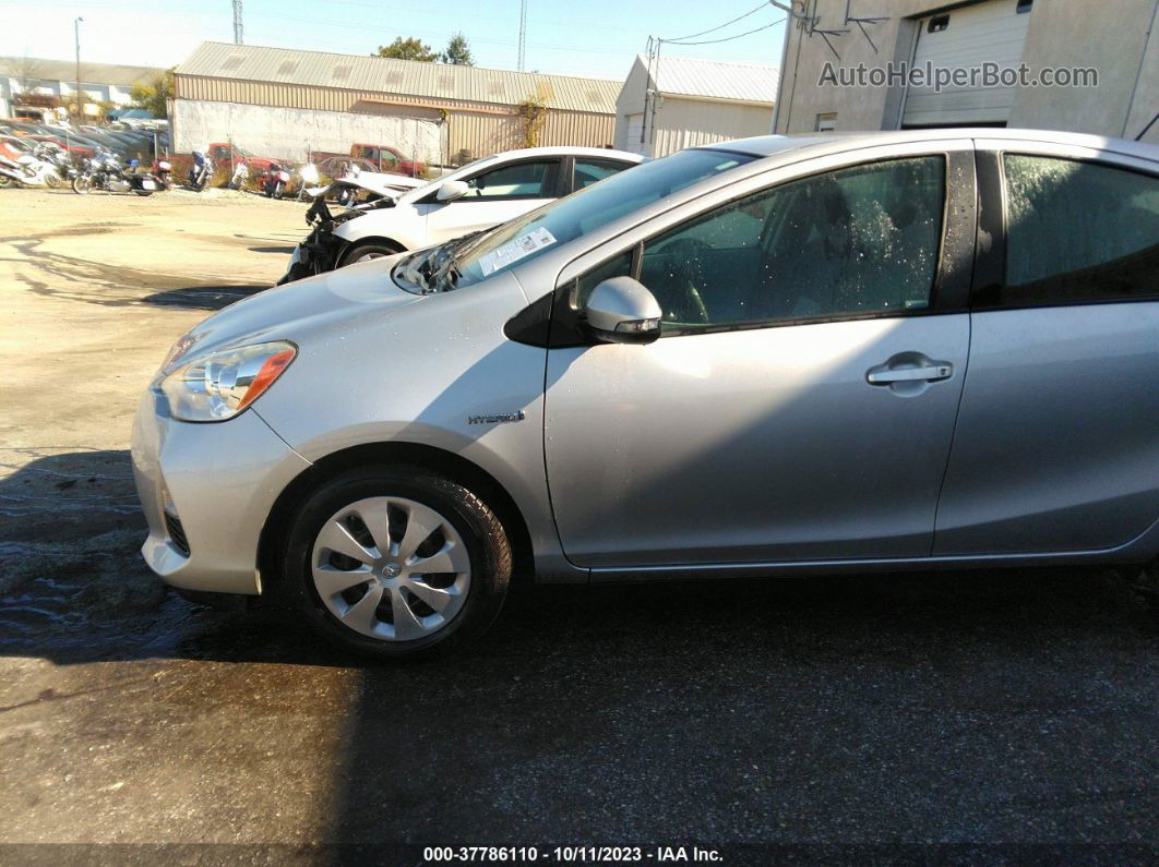 2014 Toyota Prius C One/three/two/four Silver vin: JTDKDTB33E1071040