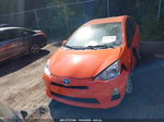 2014 Toyota Prius C Two Orange vin: JTDKDTB33E1077386