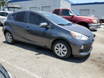 2014 Toyota Prius C  Серый vin: JTDKDTB33E1575328