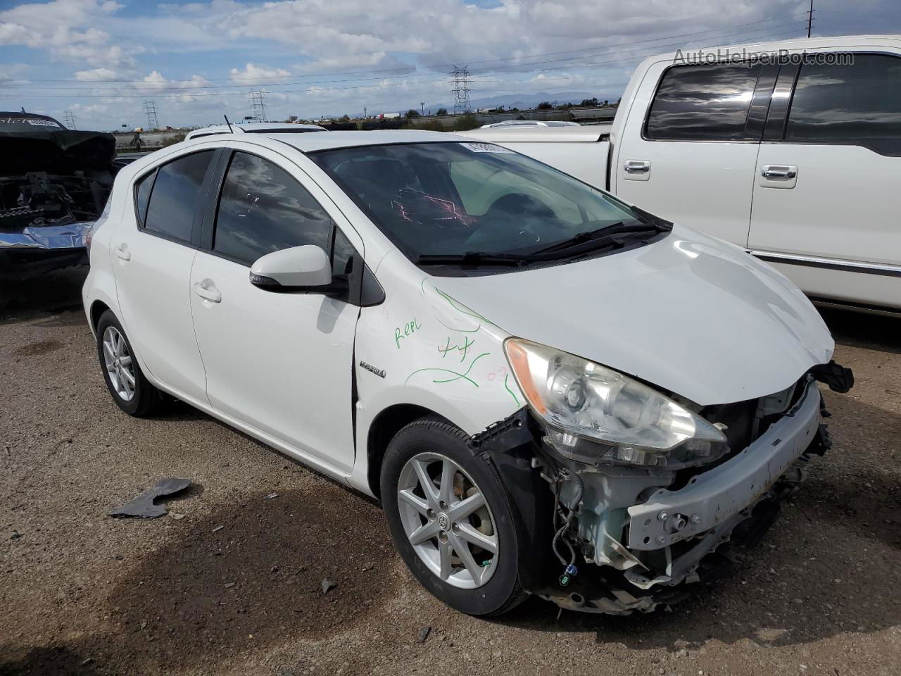 2012 Toyota Prius C  White vin: JTDKDTB34C1005836