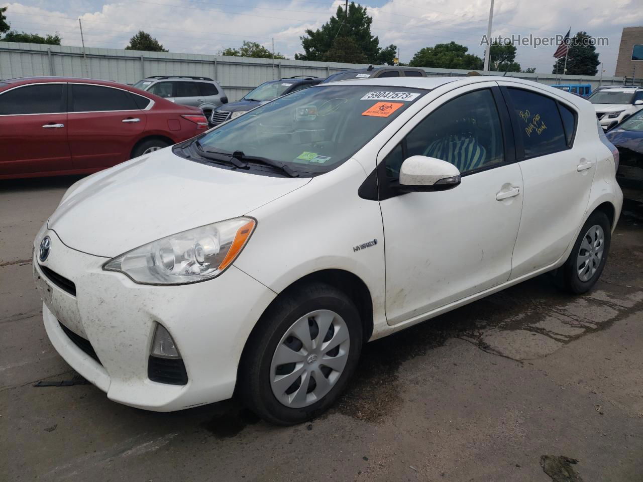 2012 Toyota Prius C  White vin: JTDKDTB34C1527463