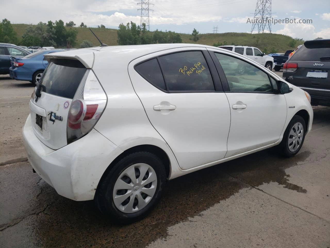 2012 Toyota Prius C  White vin: JTDKDTB34C1527463