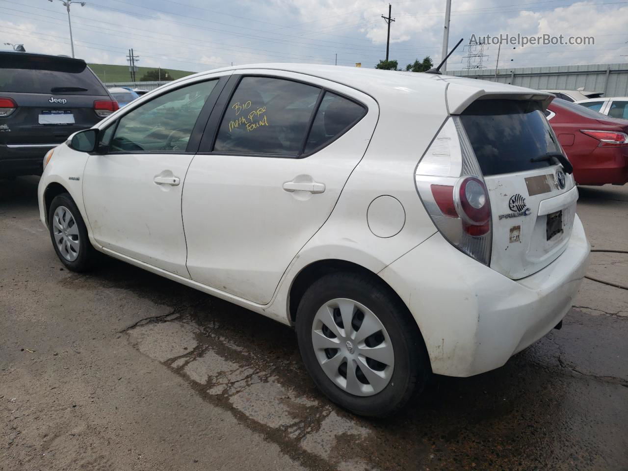 2012 Toyota Prius C  White vin: JTDKDTB34C1527463