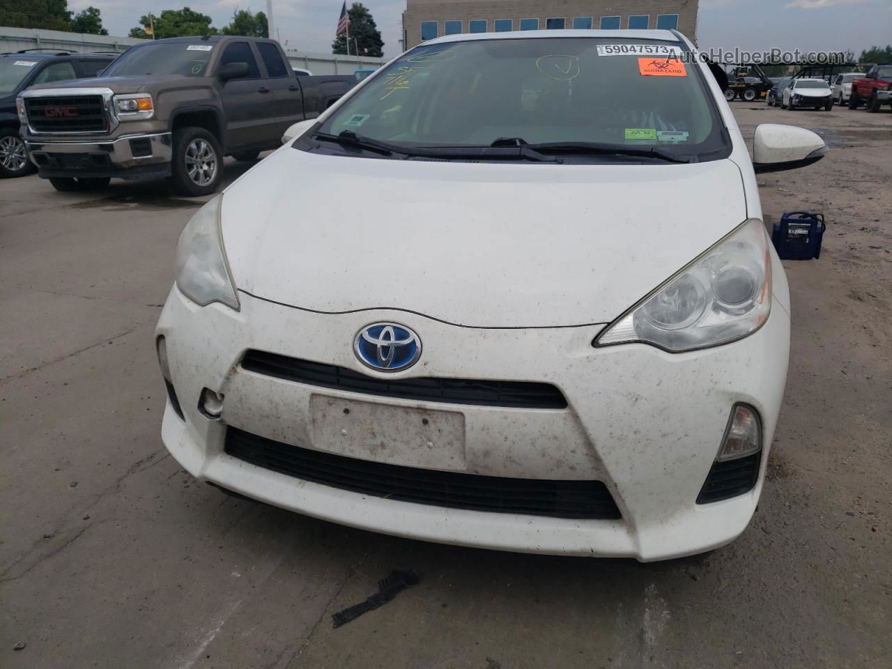 2012 Toyota Prius C  White vin: JTDKDTB34C1527463