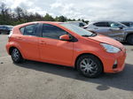 2014 Toyota Prius C  Оранжевый vin: JTDKDTB34E1065876