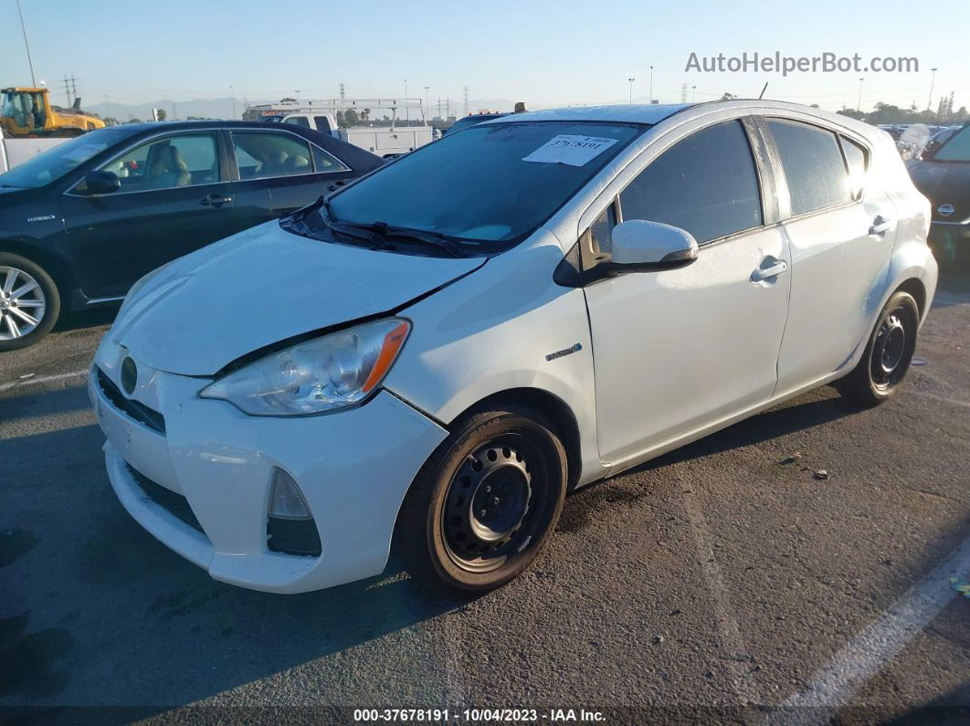 2014 Toyota Prius C One/three/two/four White vin: JTDKDTB34E1068731