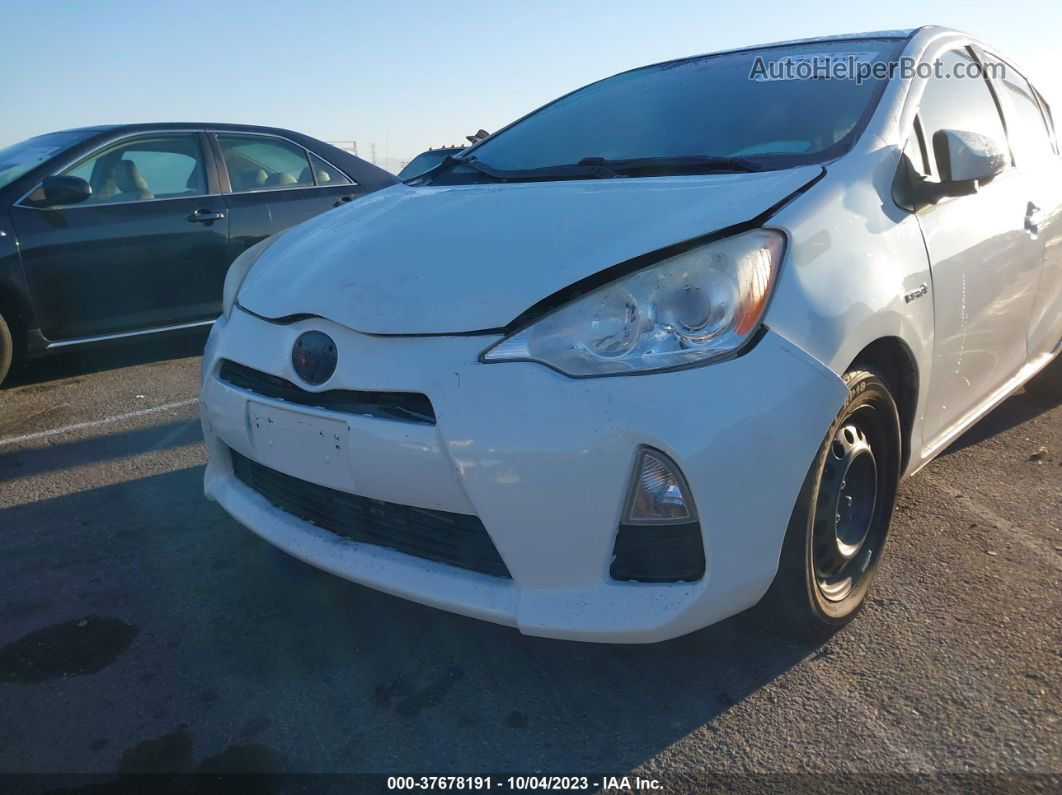 2014 Toyota Prius C One/three/two/four White vin: JTDKDTB34E1068731