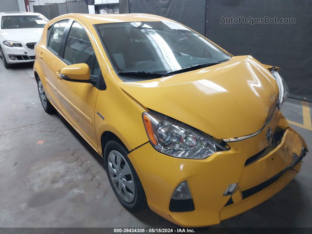 2014 Toyota Prius C Two Yellow vin: JTDKDTB34E1078112