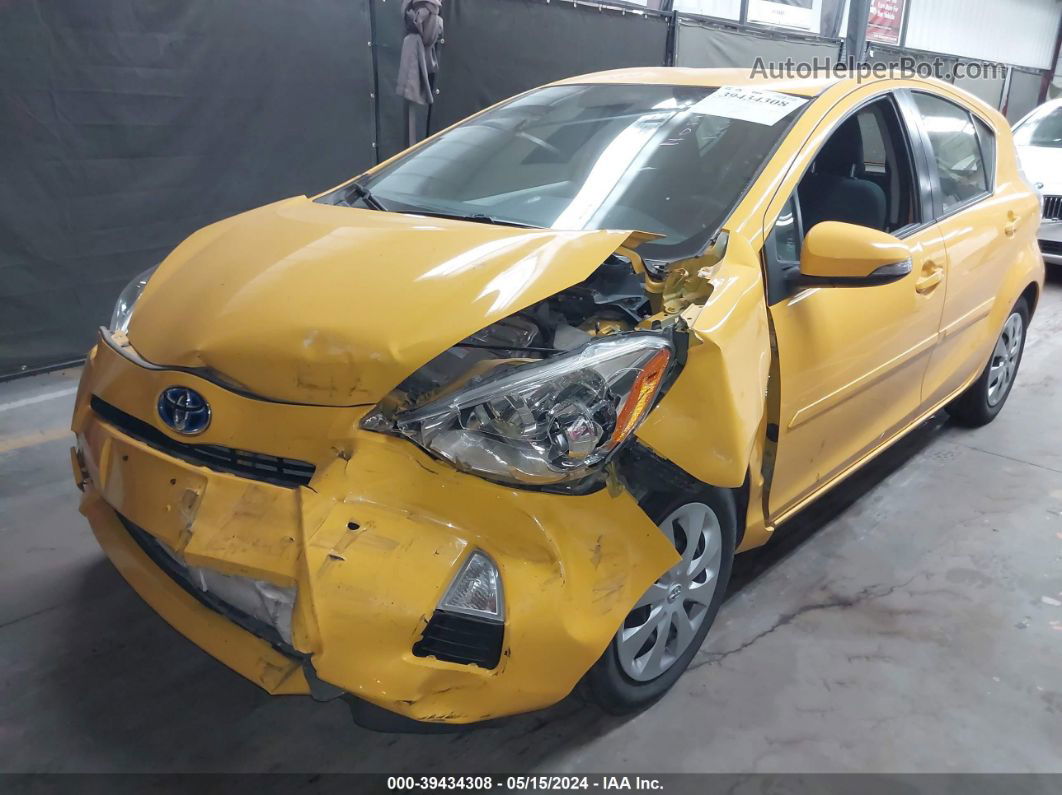 2014 Toyota Prius C Two Yellow vin: JTDKDTB34E1078112