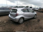 2014 Toyota Prius C One/three/two/four Silver vin: JTDKDTB34E1566623